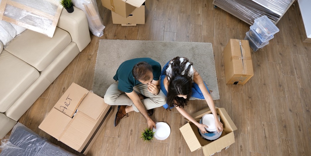 Friendly Cloverdale moving team with packed boxes