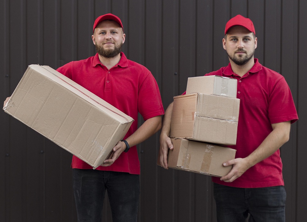 Newton Surrey movers helping residents with boxes