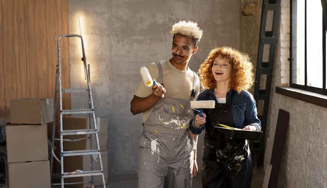 West Vancouver movers carrying furniture down a residential driveway